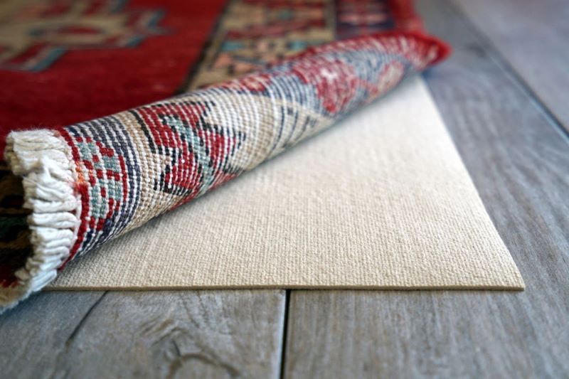 How should you protect your rugs
